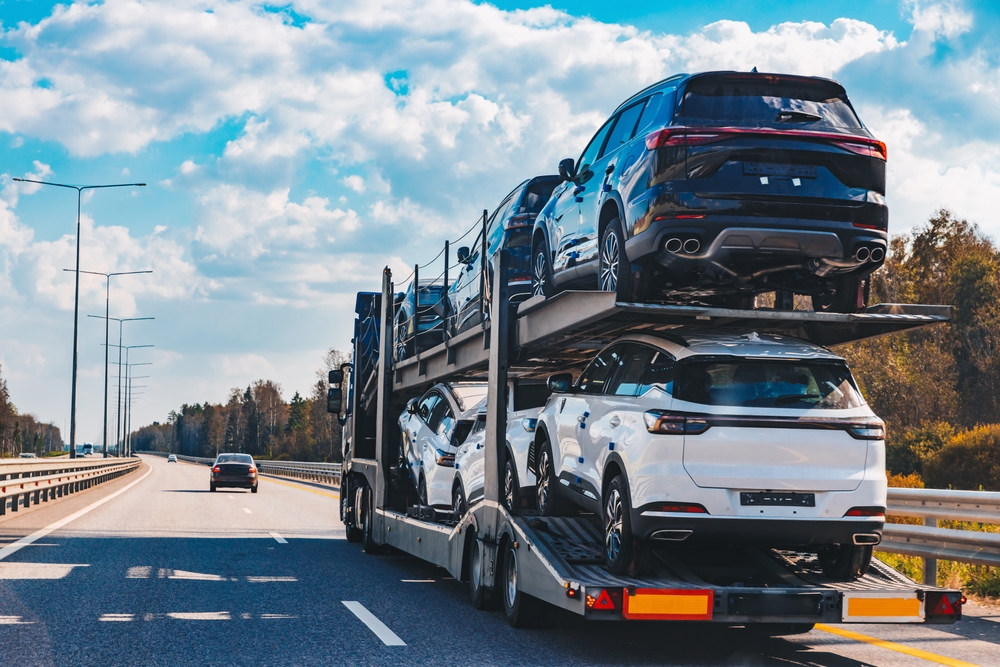 car,transport,truck,driving,on,highway,road.,car,carrier,trailer